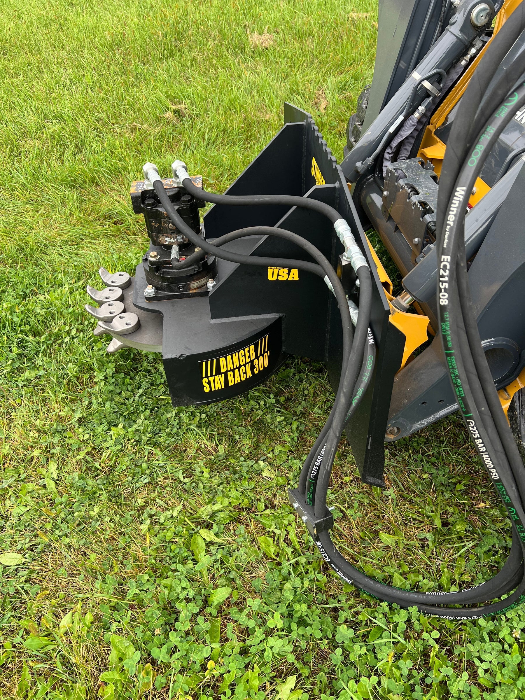 Unleash Power and Precision with the Stinger Attachments Skid Steer Stump Grinder